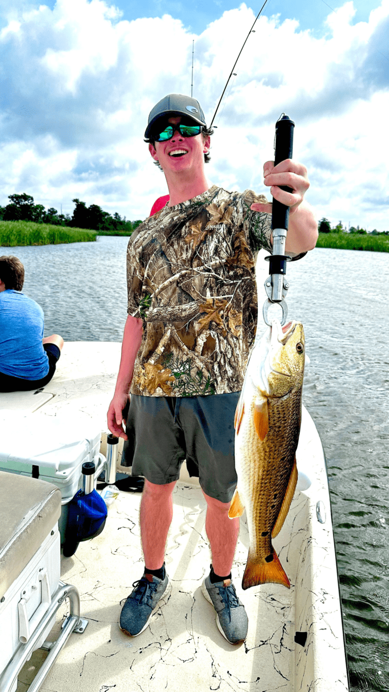 Angler with redfish