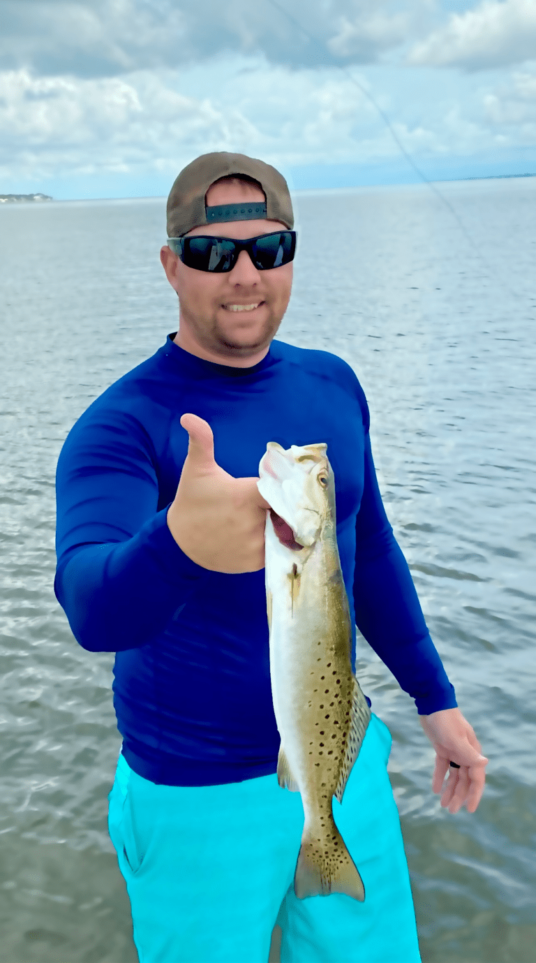 Angler with speckled trout