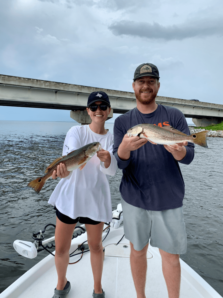 Family with fish catch