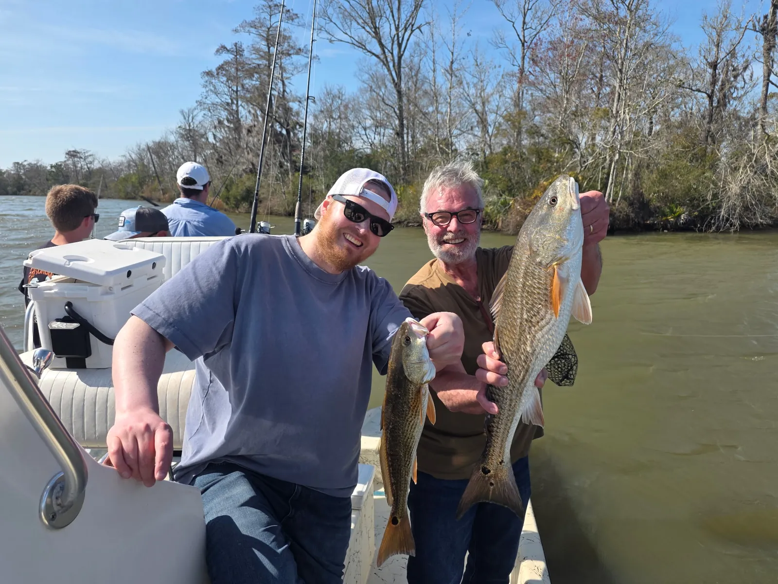 Two anglers with redfish catch on Black Creek charter