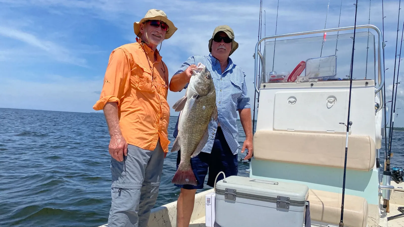 Two anglers with black drum catch on Choctawhatchee Bay