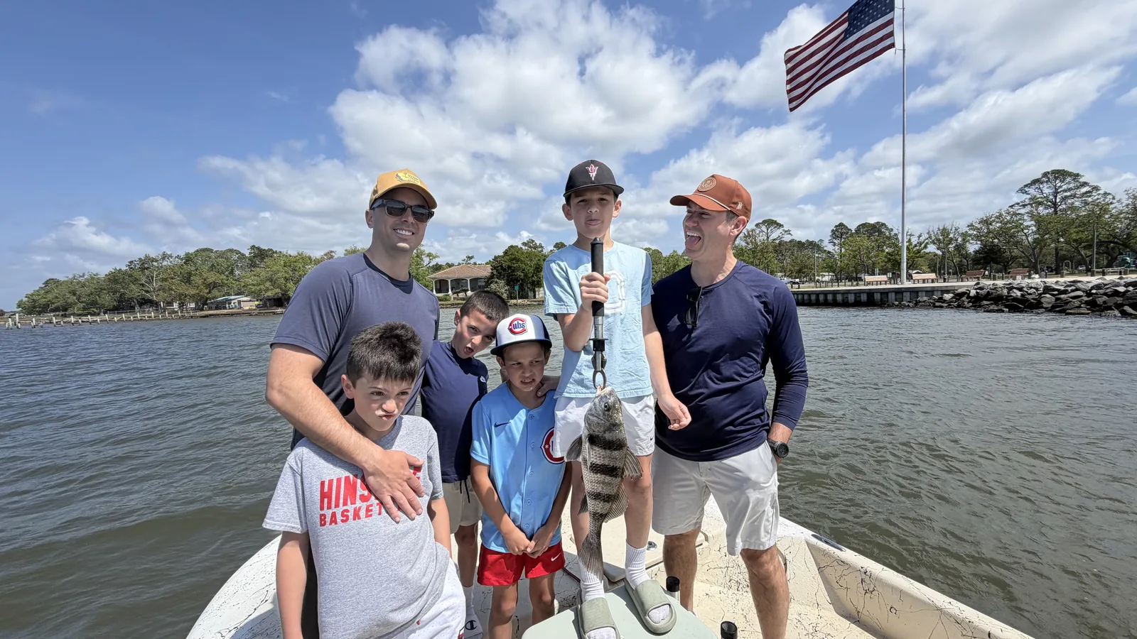 Family group charter with jack crevalle catch on Choctawhatchee Bay